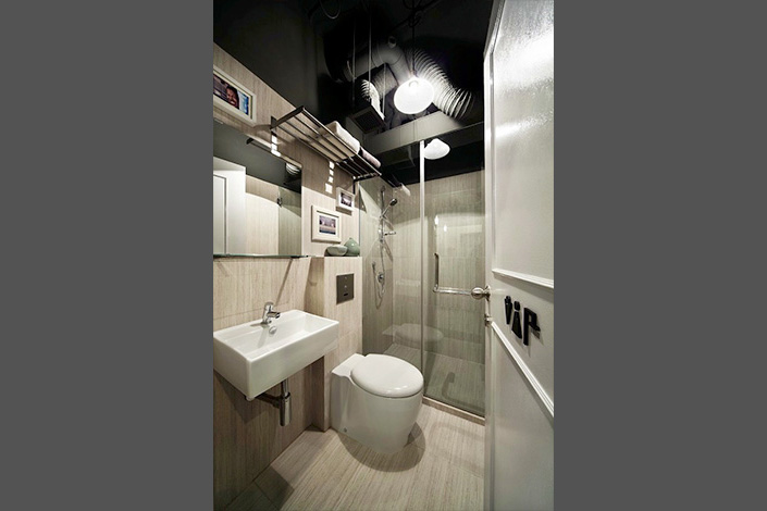 Self-contained bathroom with shower facilities